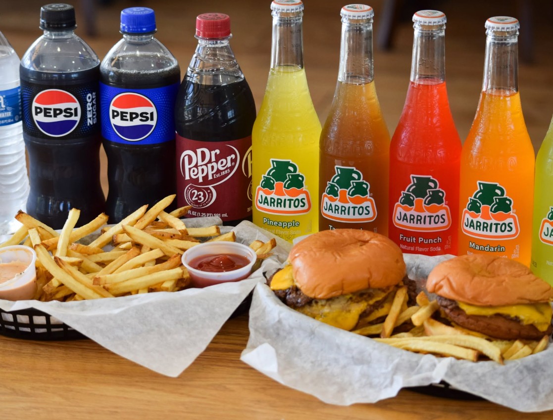 Burgers, fries and bottled drinks